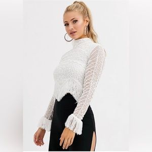 TASSEL HIGH NECK EMBELLISHED CROP TOP IN WHITE-CREAM